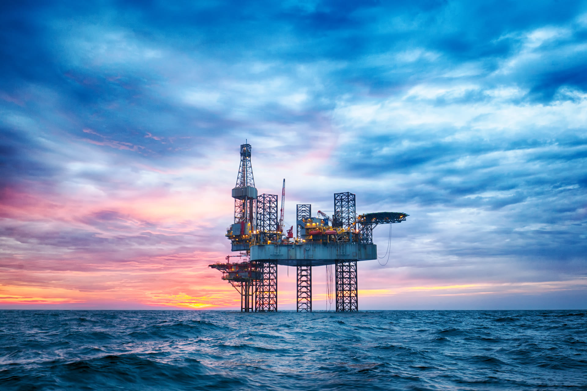 Offshore oil rig at sunset in the North Sea
